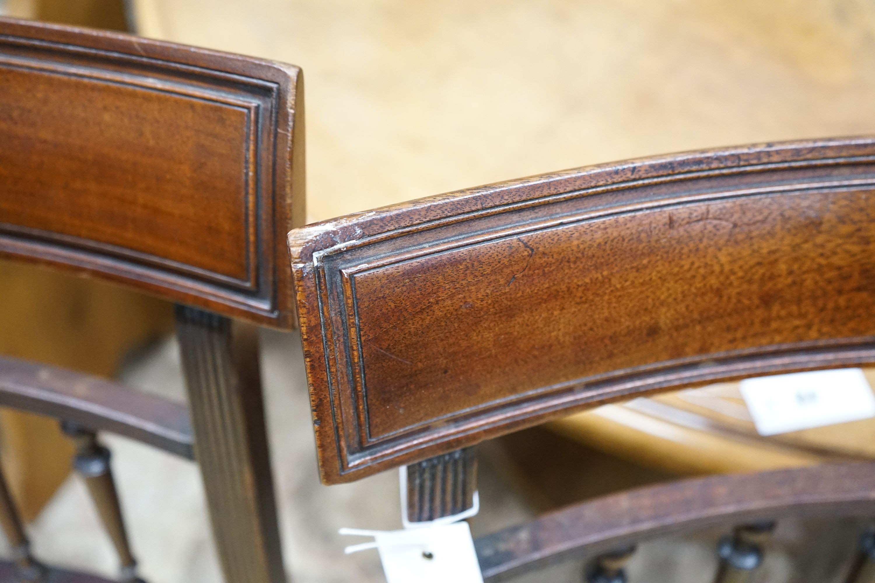 A set of four George IV mahogany dining chairs